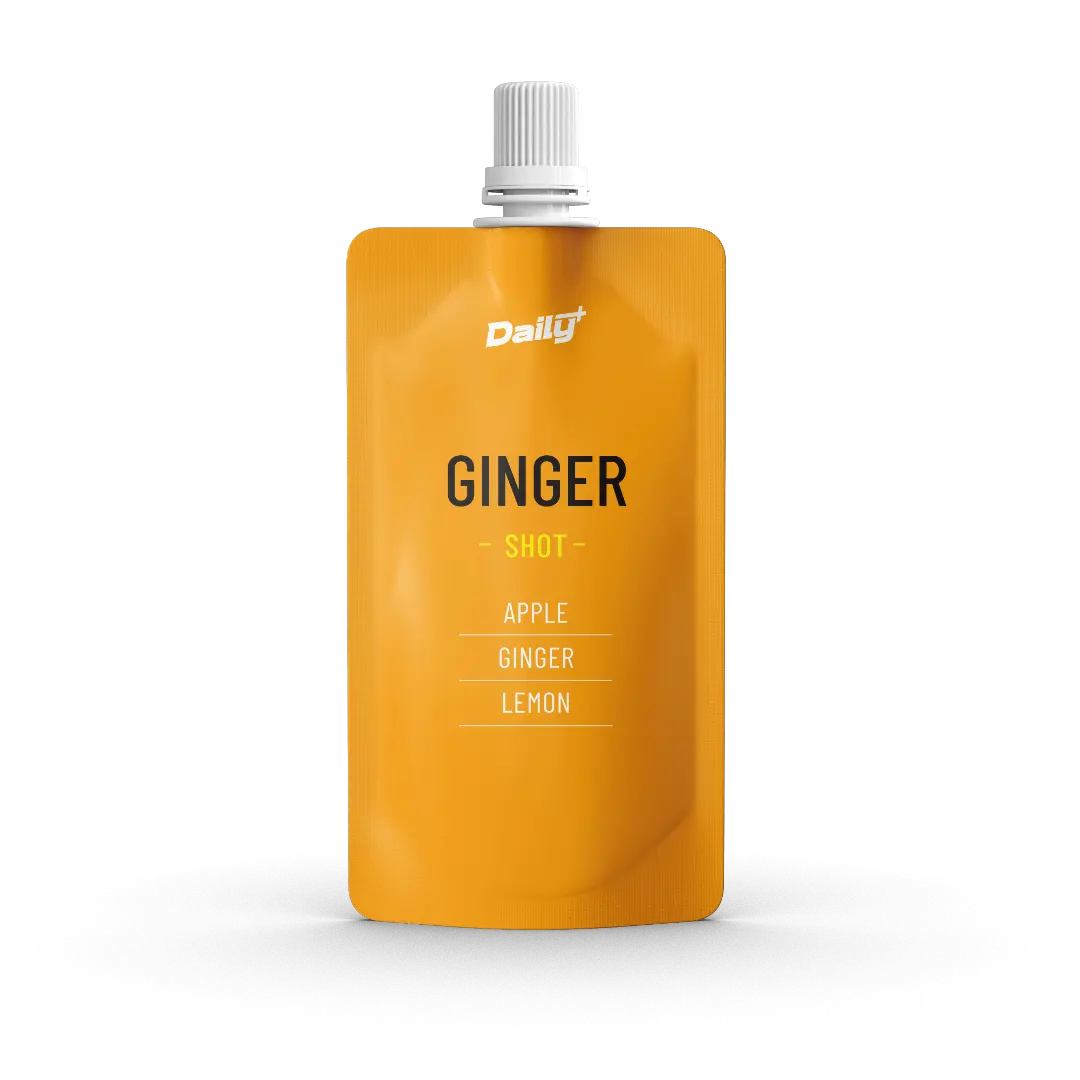 Orange packaging of a ginger shot with 'Dally' branding on a white background